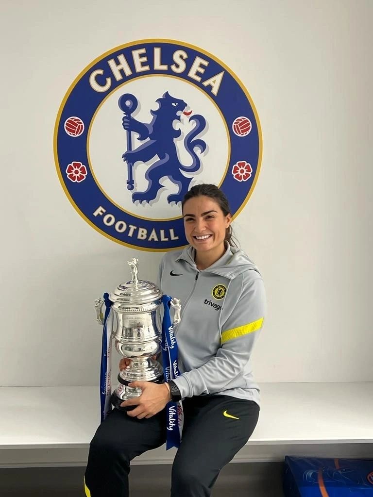 AP Physiotherapy physiotherapist with Chelsea FC trophy